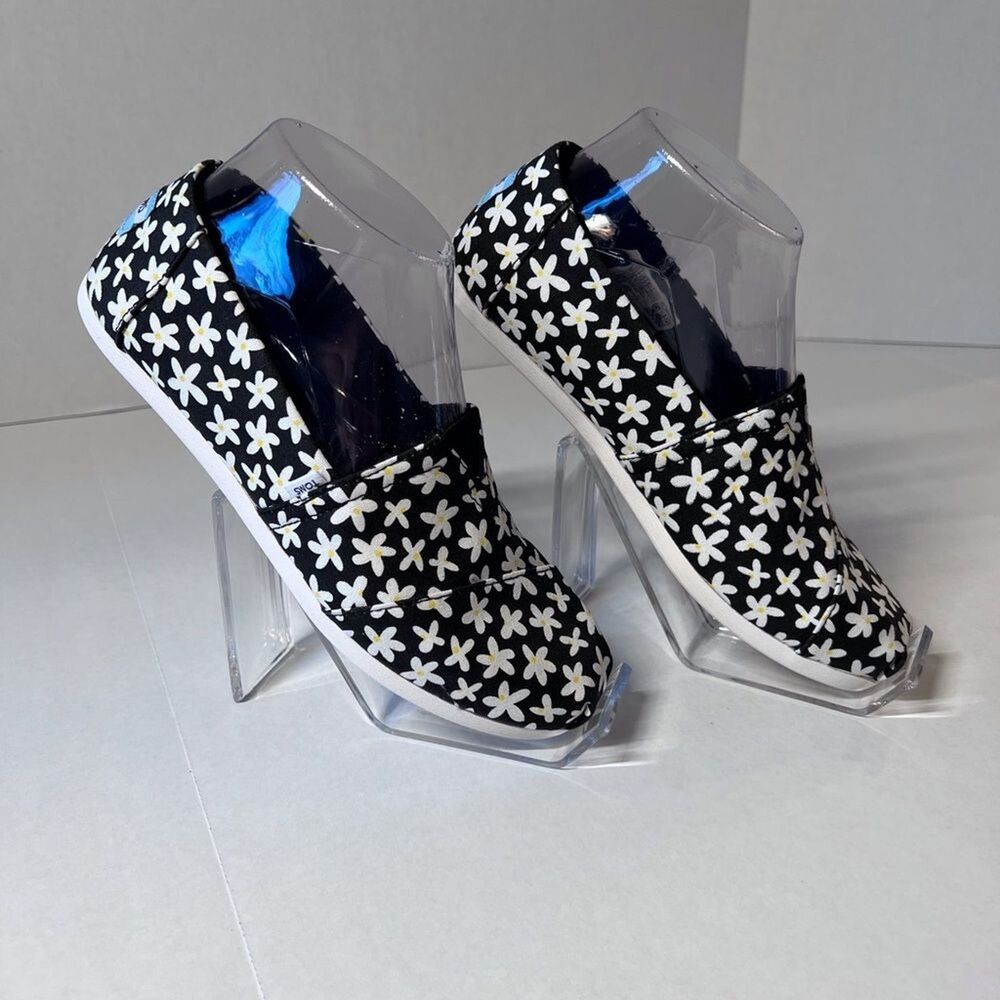 TOMS Black Canvas Slip-Ons with White Daisy Print Comfort Shoes